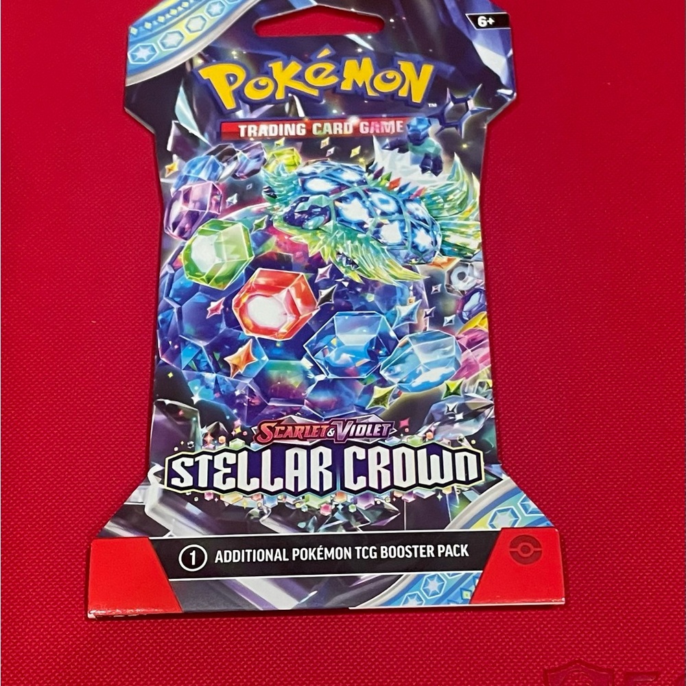 Pokemon Stellar Crown Booster Pack with Red and Blue Accents